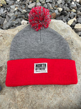 Load image into Gallery viewer, Pom Pom Winter Woven Label Beanie
