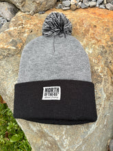 Load image into Gallery viewer, Pom Pom Winter Woven Label Beanie
