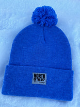 Load image into Gallery viewer, Pom Pom Winter Woven Label Beanie
