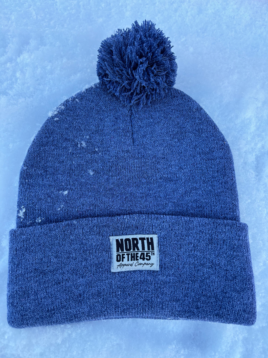 Pom Pom Winter Woven Label Beanie