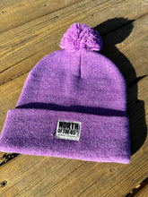 Load image into Gallery viewer, Pom Pom Winter Woven Label Beanie
